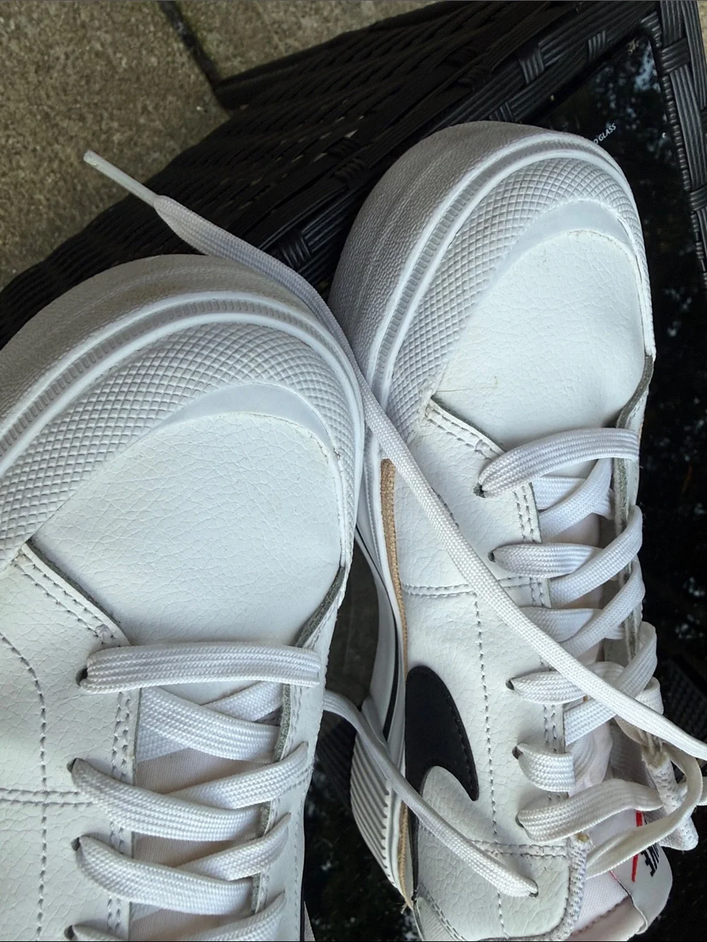 Nike White Sneakers with Black Swoosh and Small Red Logo